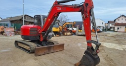 Mini bager Wacker Neuson težine 7500 kg. God.pr 2008